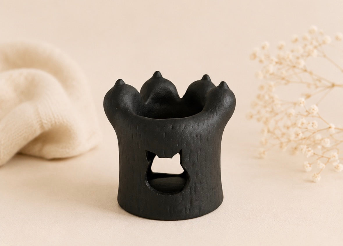 Wax brander poezenpoot